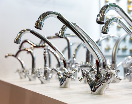 Guthrie Kitchen And Bath Plumbing With Silver Faucets